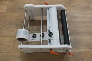 Labeling machine for beekeepers